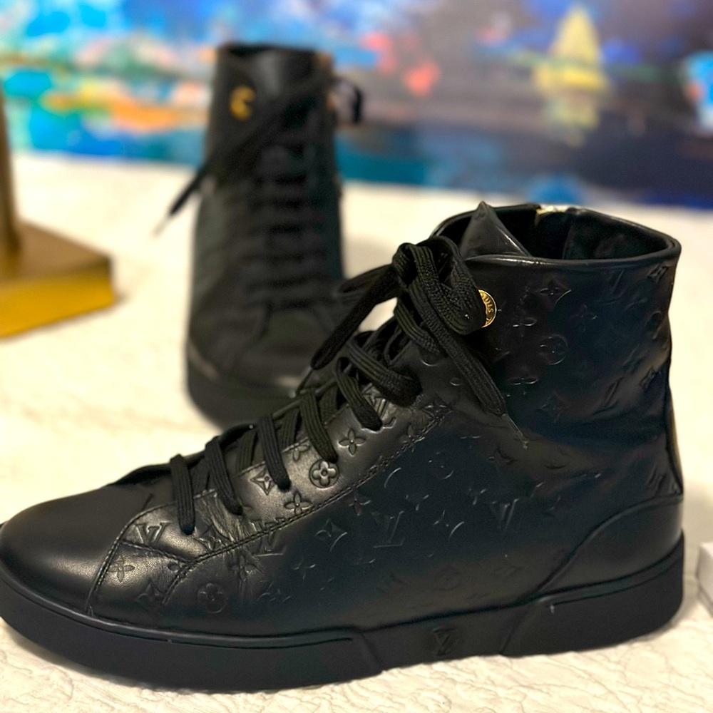 LOUIS VUITTON Calfskin
Embossed Monogram High Top Sneakers